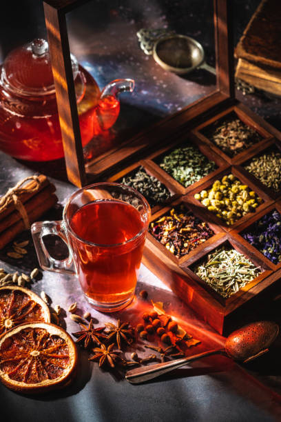 istock Red tea with a box of tea herbs and aromatic spices 1298181178
