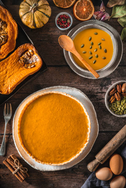 istock Autumn pumpkin meal with pumpkin pie, butternut squash soup with ingredients 1298182050