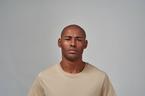 istock Unhappy person is staring angrily at camera 1298183367