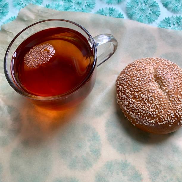 Cup of Tea and Sesame Bagel