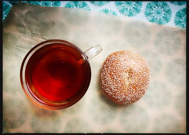 Cup of Tea and Sesame Bagel