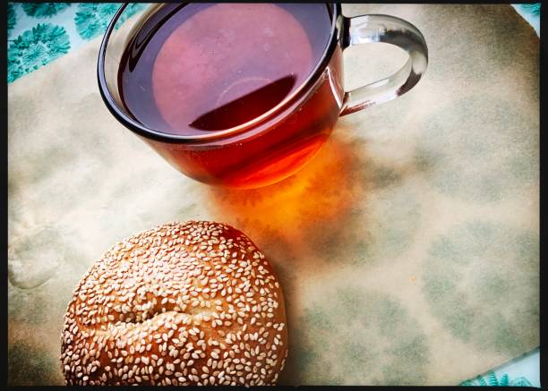 Cup of Tea and Sesame Bagel
