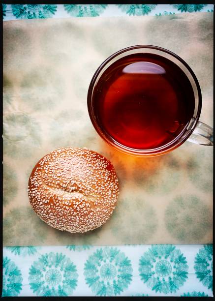 Cup of Tea and Sesame Bagel