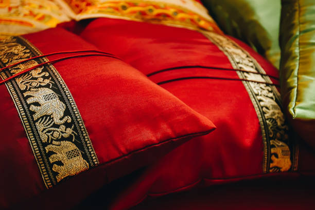 istock Close up red elephant embroidered satin pillows 1298186709
