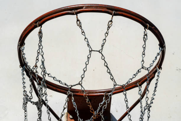 istock Old basketball hoop with a metal net 1298186759
