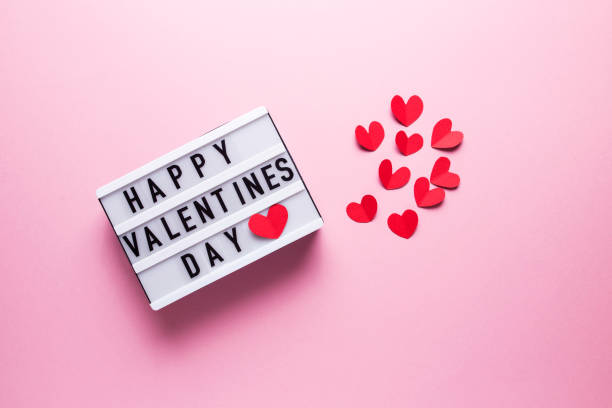 istock Box with the inscription Happy Valentine's Day on a pink background 1298186814