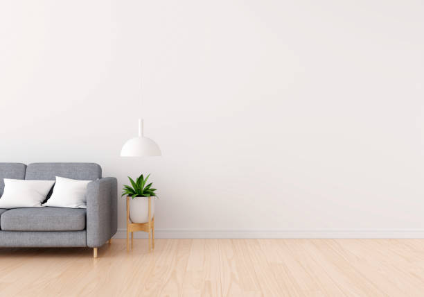 istock Sofa in white living room with free space for mockup,3D rendering 1298187111