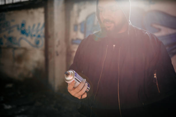 istock Grafitti artist at work 1298188175
