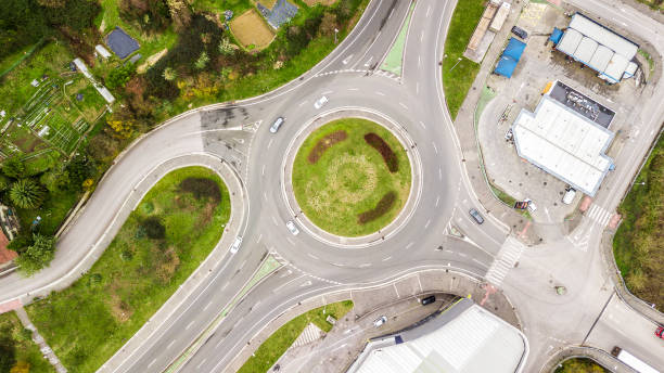 istock drone view of urban traffic circle 1298188199