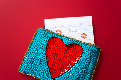 Love Note in Heart Purse, Red Background