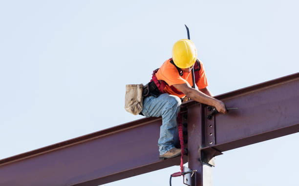 istock Hispanic ironworker working on a steel girder 1298191580
