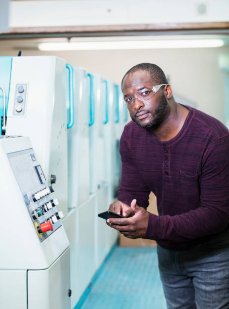 istock African-American man working in printing plant 1298192593