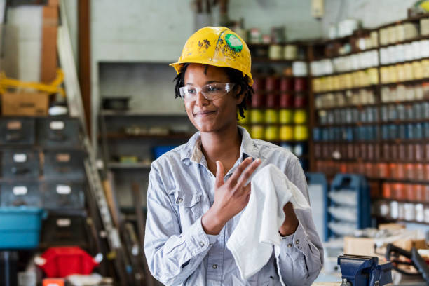 istock Black woman working in printing plant 1298193145