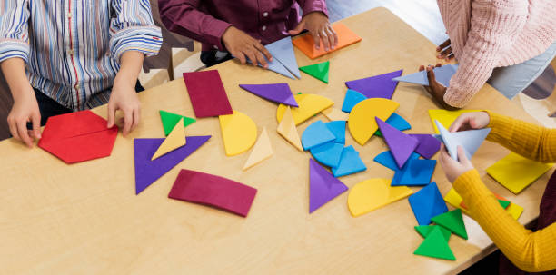 istock Children in school with geometric shapes 1298193272