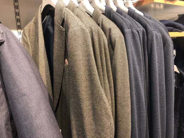 istock Men coat mean wearing 1298194180
