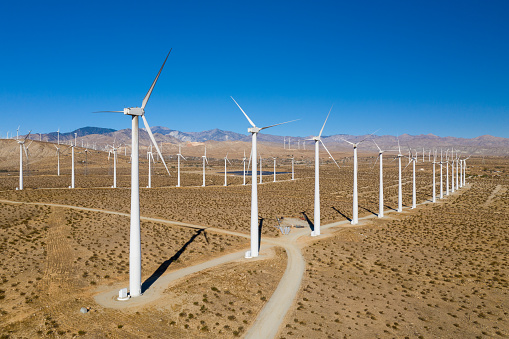 Drone shot of wind turbines.