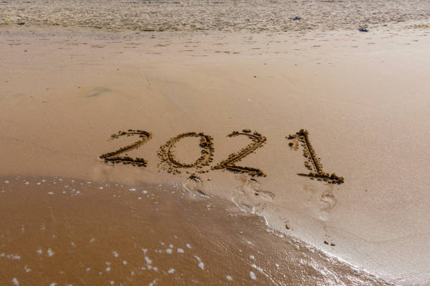 istock New year 2021 written on the beach 1298195063