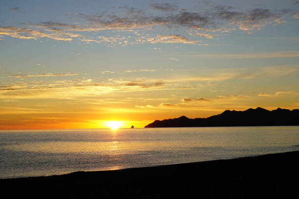 istock Sunrise Green Water 1298198077