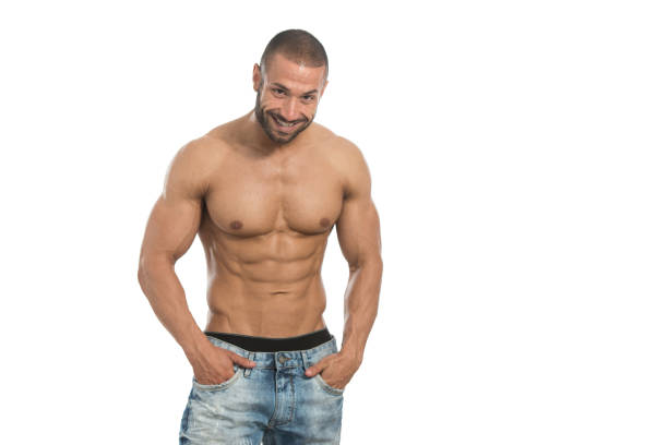 istock Portrait Of A Bodybuilder Posing Over White Background 1298198279