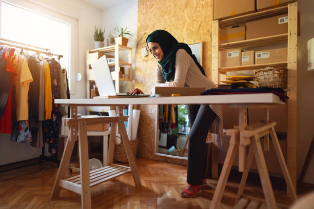 istock Muslim woman entrepreneur doing e-commerce business on the internet 1298198896