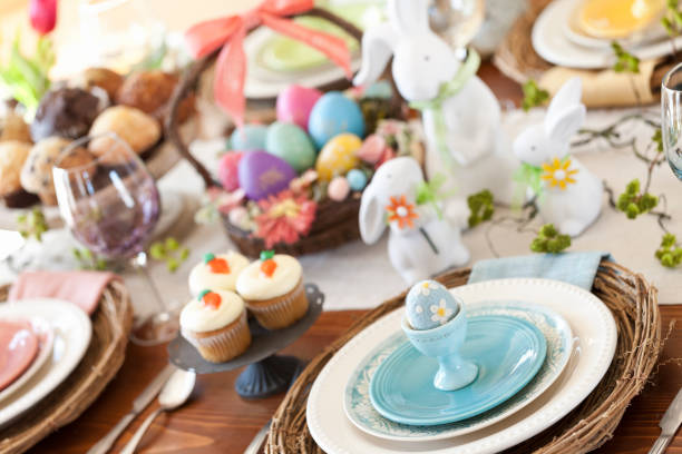 Easter Dining Easter Dining with Light Blue Place Setting carrot cake day stock pictures, royalty-free photos & images