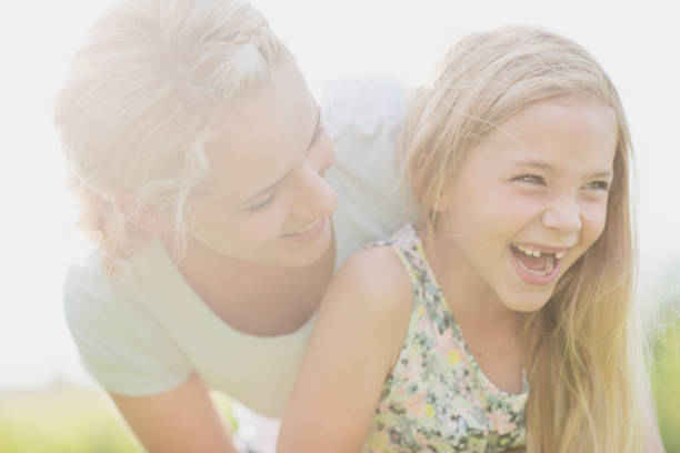 istock Mother and daughter spending time outdoors together 1298200092