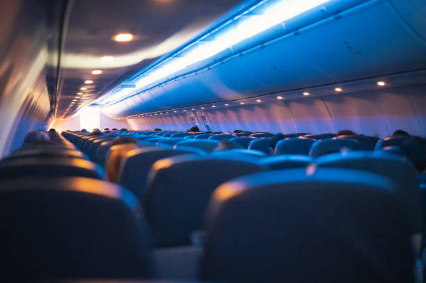 Empty seat Plane social distance flying during Covid-19 stock photo