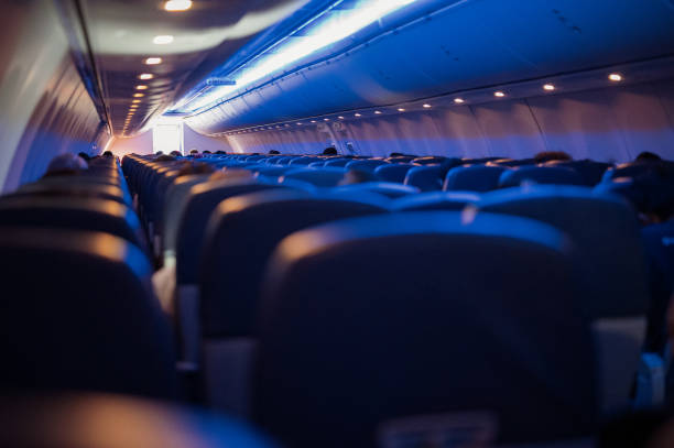 istock Close up shot seat in airplane at night 1298209539