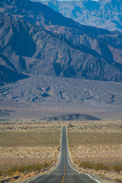 istock An empty road running straight through Death Valley 1298210479