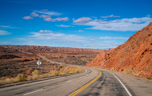 The way forward - driving on empty road Arizona