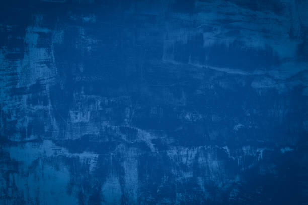 istock Abstract blue cement and background. Dark grunge concrete texture. 1298218326