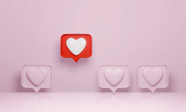 istock 3d rendering, social media notification like heart icon in red speech bubble pin stand out from the crowd on pink background. 1298218393