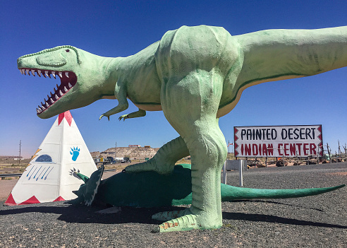 October 14, 2018 - Holbrook, Arizona, U.S.: Native American tourist gift shop entices with Indian dwellings and dinosaurs.