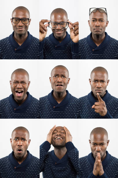 Middle-Aged bald African descent black man with glasses making facial expressions Series of nine images of a Middle-Aged bald African descent black man with glasses making facial expressions including smug, mischievious, aloof, angry, distraught, scolding, shocked, relieved and focused. relieved face stock pictures, royalty-free photos & images