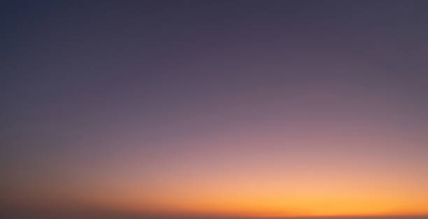 istock Sunset sky. Abstract nature background. Dramatic blue with orange colorful clouds in twilight time. 1298229180