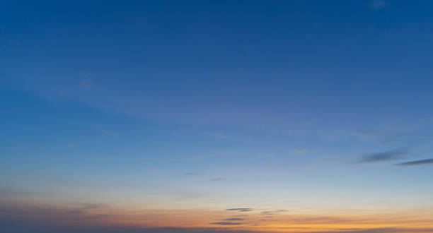 istock Sunset sky. Abstract nature background. Dramatic blue with orange colorful clouds in twilight time. 1298229239