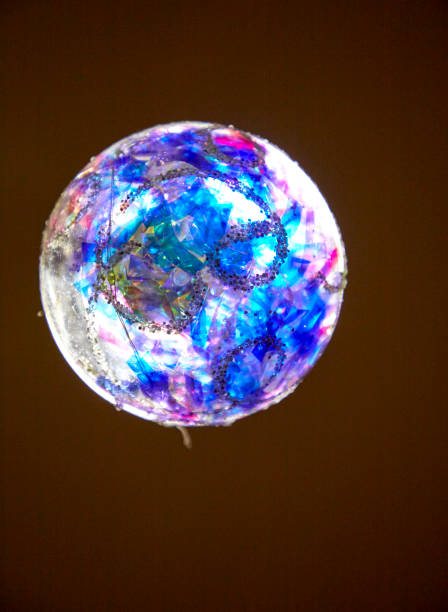 istock transparent christmas tree decorative ball with glittering filling 1298237305