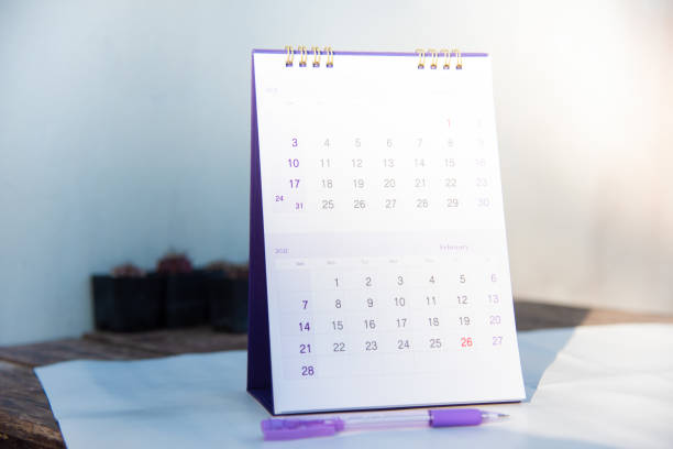 istock Blur purple calendar in planning concept. 1298238312