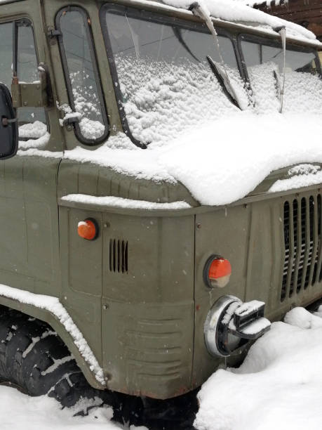 istock Winter, a car covered with snow. 1298238472