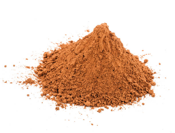 istock Pile cocoa powder on white background 1298239861