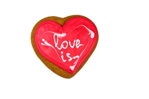 istock Heart shaped gingerbread cookie isolated on white background 1298239946