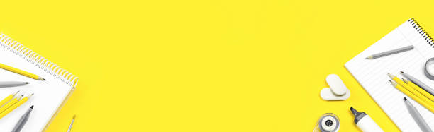 istock Assorted office and school stationery office supplies on yellow 1298240720