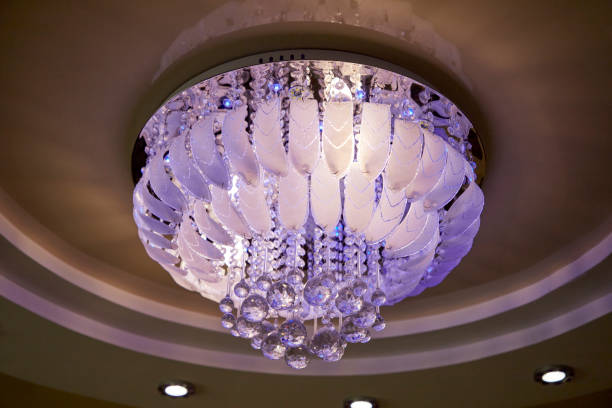 istock stylish designer chandelier on the ceiling in the hall 1298241790