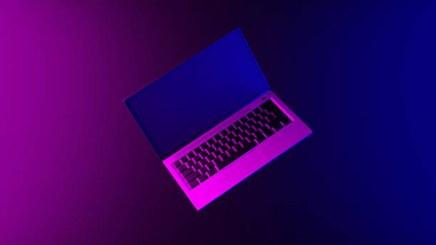 istock Laptop on an abstract light effect purple and blue wallpaper 3D render. Horizontal illustration background. 1298246768