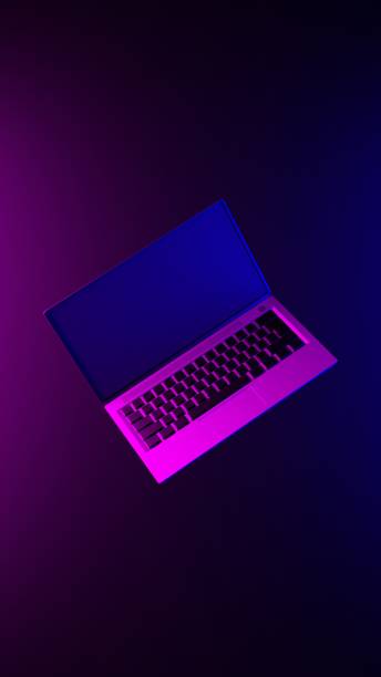 Laptop on an abstract light effect purple and blue wallpaper 3D render. Vertical illustration background.