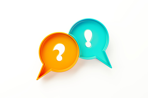 Orange and teal colored speech bubble pair with exclamation point and question mark symbols sitting over white background. Horizontal composition clipping path and copy space. Alertness and uncertainity concept.