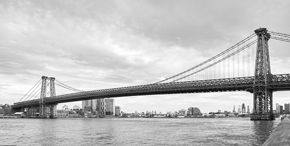 Black and white picture of Williamsburg Bridge, New York City, USA.