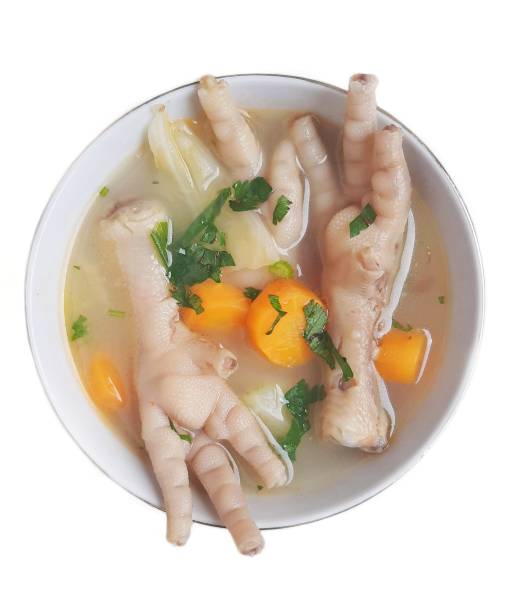 istock Chicken feet soup in a white bowl 1298249489