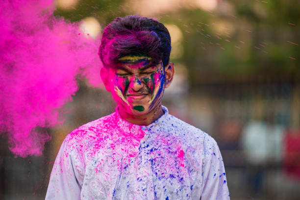 istock Young boy Celebrating Holi Festival 1298251696