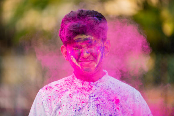 istock Young boy Celebrating Holi Festival 1298251839
